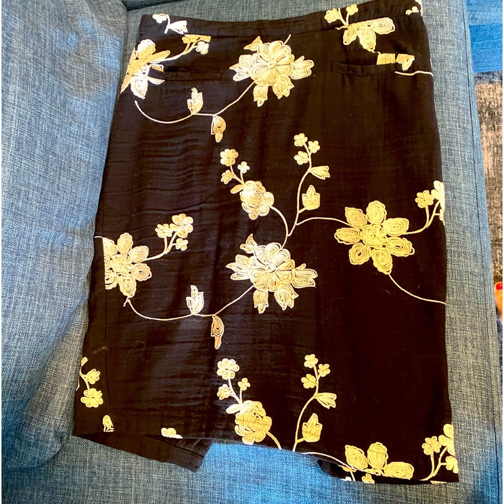 Cotton pencil skirt with hand stitched pattern.